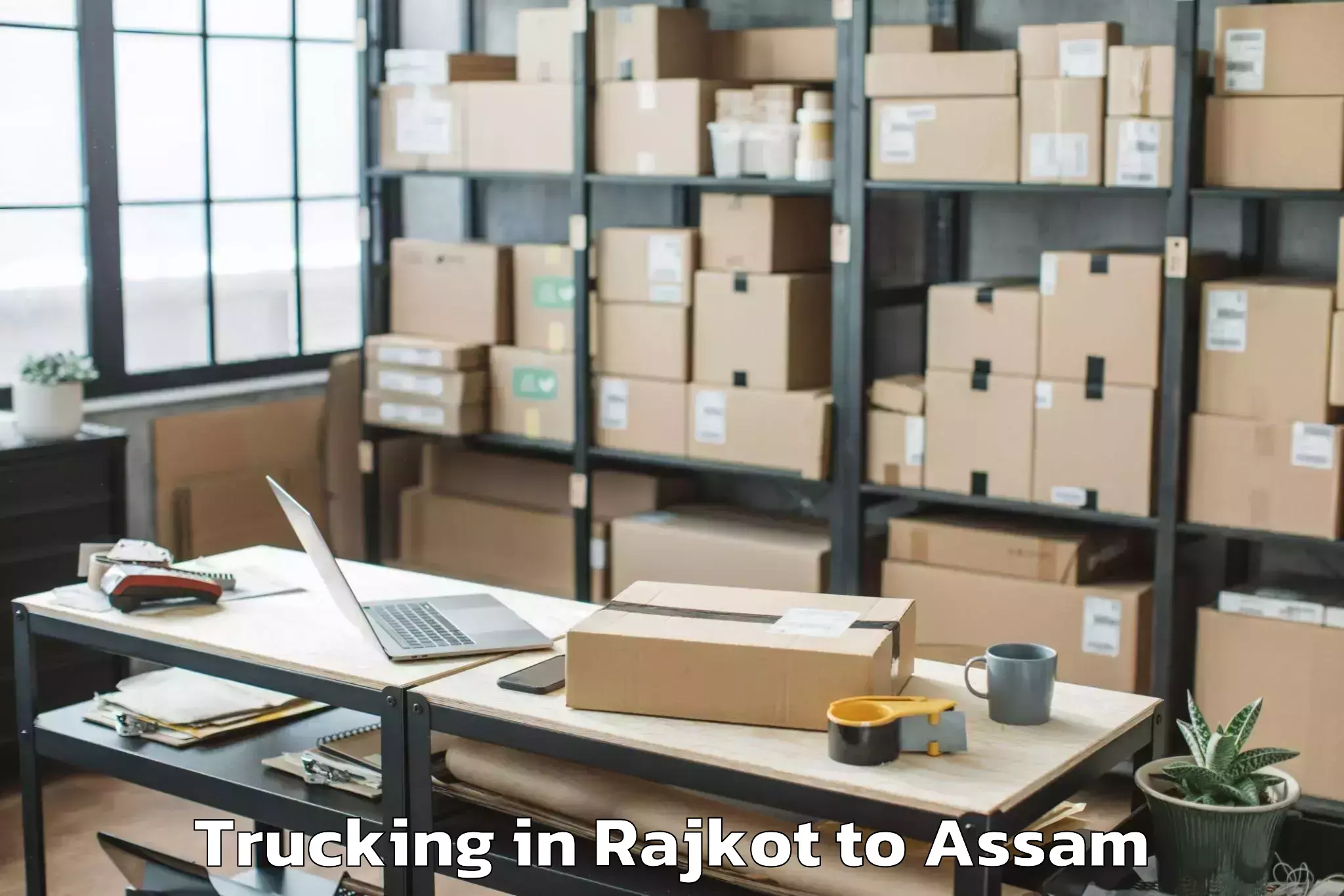 Easy Rajkot to Bokakhat Trucking Booking